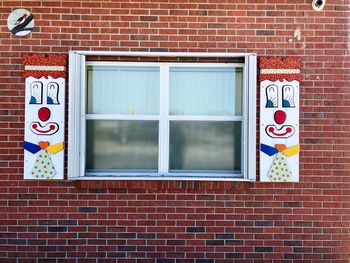 Close-up of window on brick wall