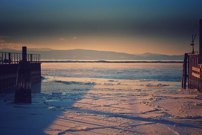 Scenic view of sea against sky at sunset
