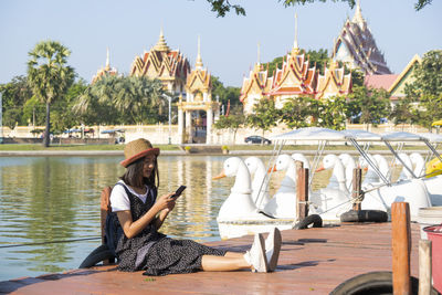 Woman sitting at temple