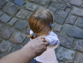 Close-up of boy holding baby girl