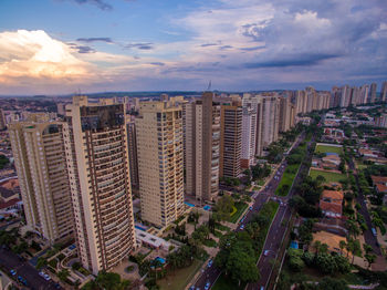 High angle view of buildings in city against sky