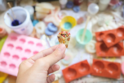 Close-up of hand holding food