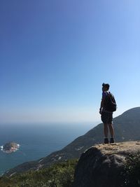 Man photographing on mountain