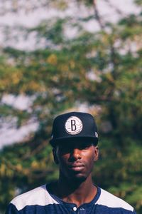 Portrait of young man wearing hat