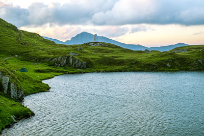 Sunrise on fagaras high mountain ridge. romanian mountain landscape with high peaks over 2200m