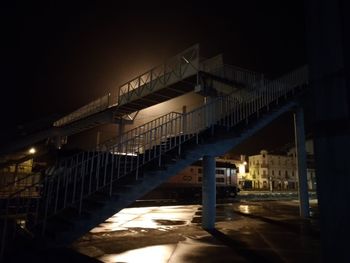 Modern building against sky at night