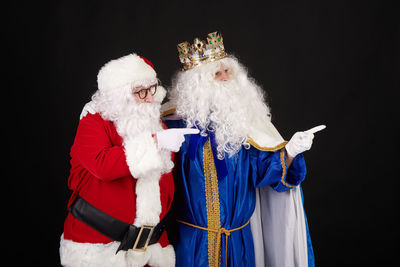 Close-up of christmas decoration against black background