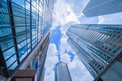 Low angle view of modern buildings against sky