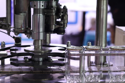 Close-up of machine part on table