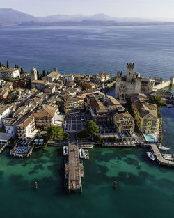 Aerial view  scaligero castle, an ancient fortress along sirmione coastal, lombardy, italy.