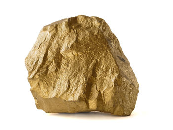 Close-up of rock against white background