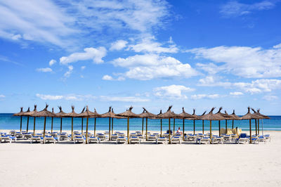 Scenic view of beach against sky, lonely person on dumbed on quarantine 