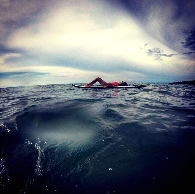 LIFEGUARD HUT IN SEA AGAINST SKY