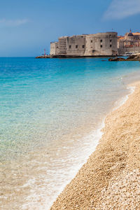 The beautiful banje beach and dubrovnik city