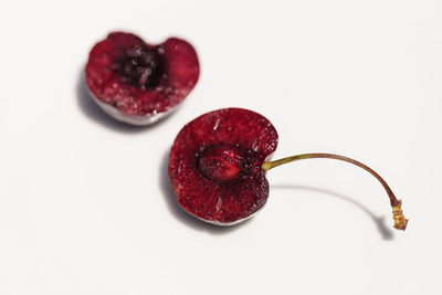 Close-up of strawberry over white background