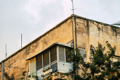 Low angle view of old building against sky