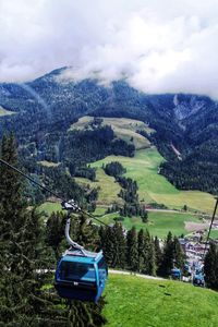 Scenic view of landscape and mountains against sky