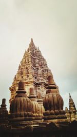 Exterior of temple against clear sky