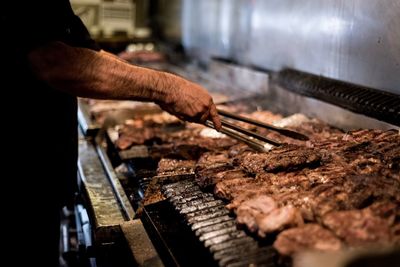 Close-up of man preparing food