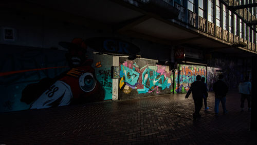 Graffiti on wall at night