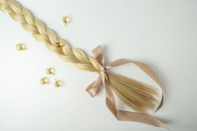 Close-up of christmas decorations on white background