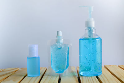 Close-up of glass bottle on table