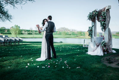 Couple standing in park