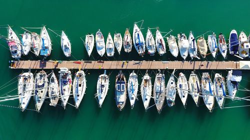 Aerial view of boats moored at harbor