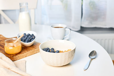 Fresh fragrant homemade granola made from oatmeal, honey and nuts. balanced breakfast or snack