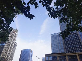 Low angle view of modern buildings against sky