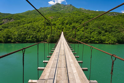 Shkopet lake with a mysterious bridge over the river leading to actually just some sheep tracks