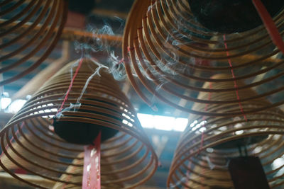 Low angle view of spiral hanging from ceiling