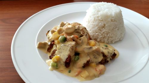 Close-up of breakfast served on table