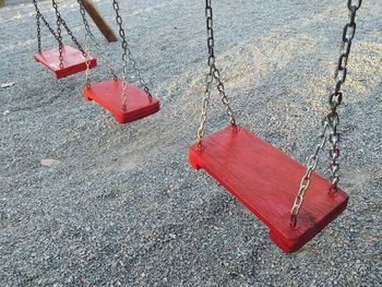 High angle view of swings hanging at playground