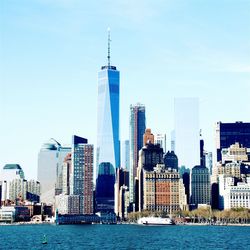 City skyline against blue sky