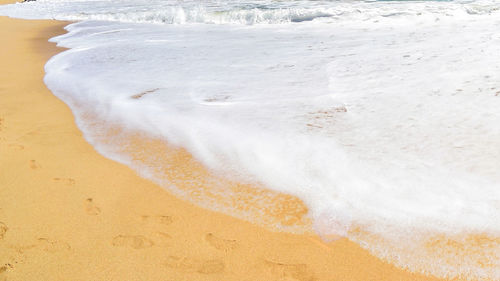 Close-up of waves on beach