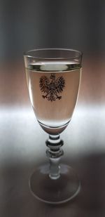 Close-up of coffee in glass on table