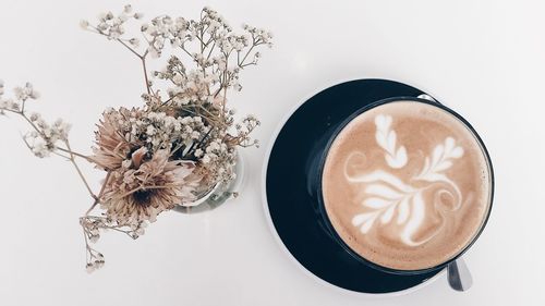 Directly above shot of cappuccino on table