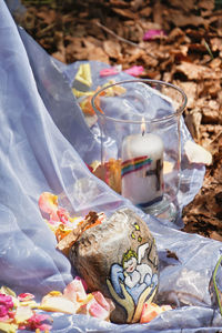 High angle view of white roses on bed