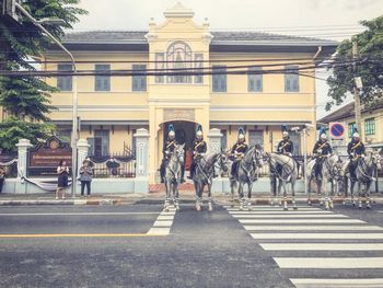 Group of people crossing road