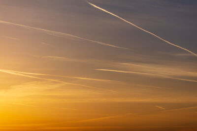 Low angle view of vapor trails in sky