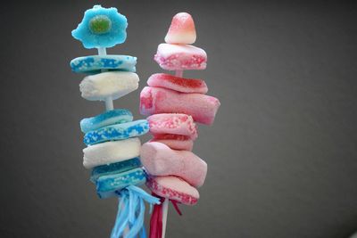 Close-up of ice cream cone against black background
