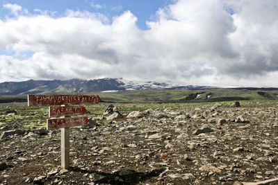 View of landscape against cloudy sky