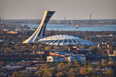 High angle view of bridge and buildings against sky