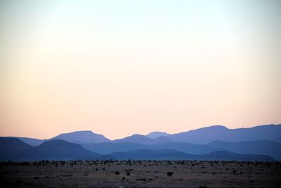Scenic view of mountains against clear sky