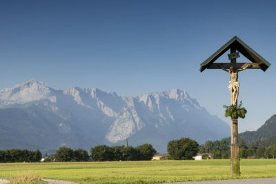 Scenic view of snowcapped mountains against clear sky