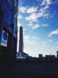 Low angle view of buildings against sky in city