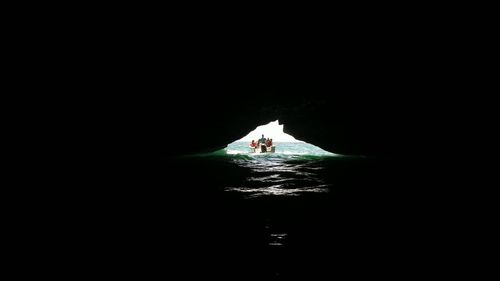 High angle view of people swimming in sea