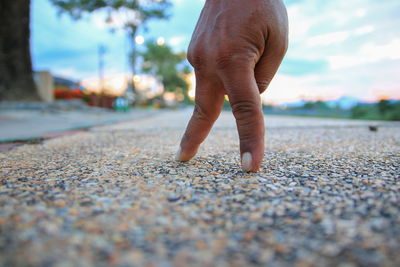 Low section of man on road