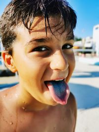 Close-up portrait of blu tongue kid